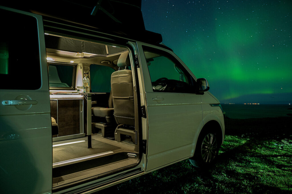 campervan northern lights aurora in Gairloch Scottish Highlands with Four Seasons Campers